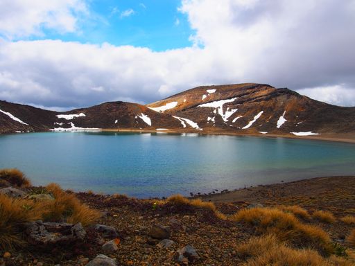 A low-angle of Tongariro lake view with the national park view