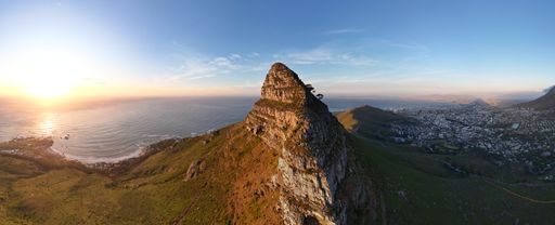 A panoramic shot of the Table Mountain in Cape Town, South Africa on a golden sunset
