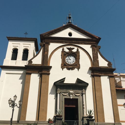 The Parrocchia di San Lorenzo on the background of bright blue sky