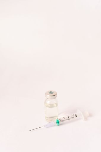 Various medical equipment, thermometer, ampoules, pipette, drugs, tablets, capsules, spray, patch, syringe, vials on a white background. Medicine,