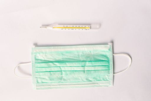 Various medical equipment, thermometer, ampoules, pipette, drugs, tablets, capsules, spray, patch, syringe, vials on a white background. Medicine,
