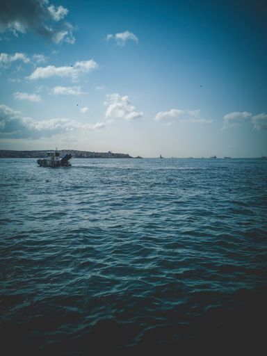 A vertical shot of an industrial boat on the water near Istanbul, Turkey