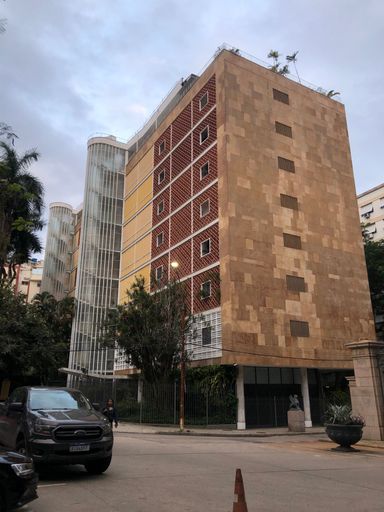 A vertical shot of town architecture in Guinle park during daytime in Rio de Janeiro, Brazil