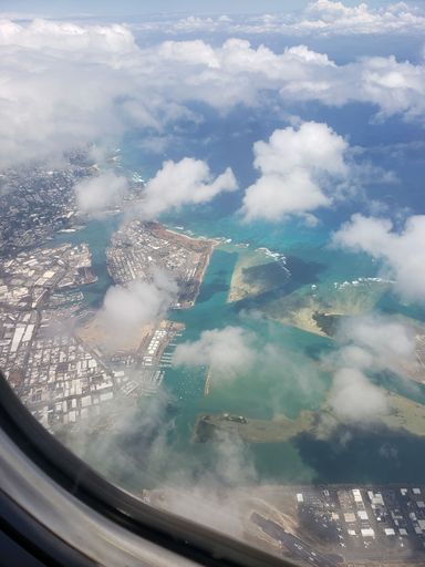 A beautiful shot from an airplane window of the Oahu in Hawaii