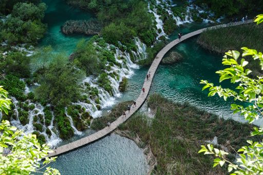 An aerial shot of a wooden path in the Plitvice Lakes National Park in Croatia