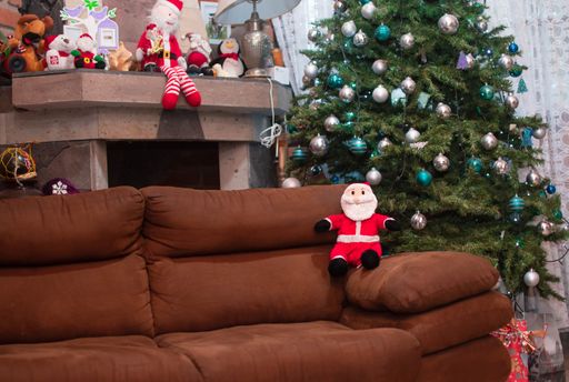 Bright and cozy interior of a living room decorated for Christmas season