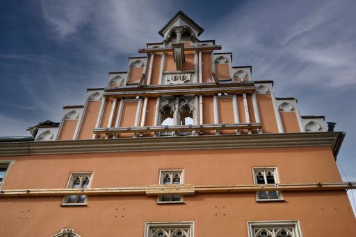 A beautiful shot of the Straubing town hall outer walls in a blue sky background