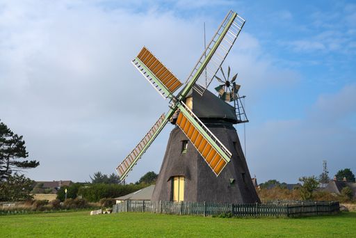 A closeup of the windmill of Nebel against the blue sky in Amrum, Germany
