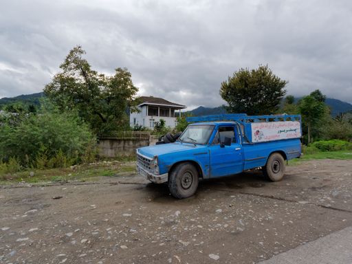 A vintage blue pickup truck in Gilan Province, Iran
