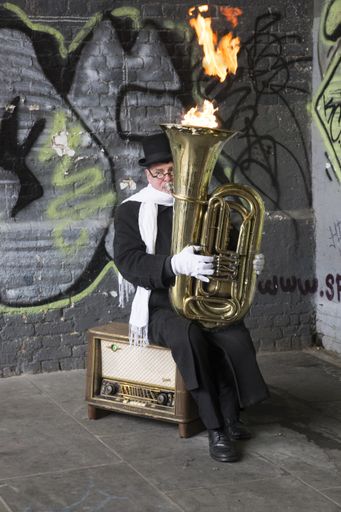  Christopher Werkowicz AKA Fire Tuba,  a magnificent street performer photographed on the South Bank, London, UK