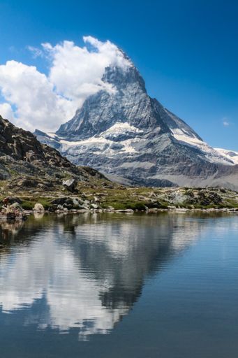 A vertical shot of the Matterhorn, a mountain of the Alps on the border between Switzerland and Italy.
