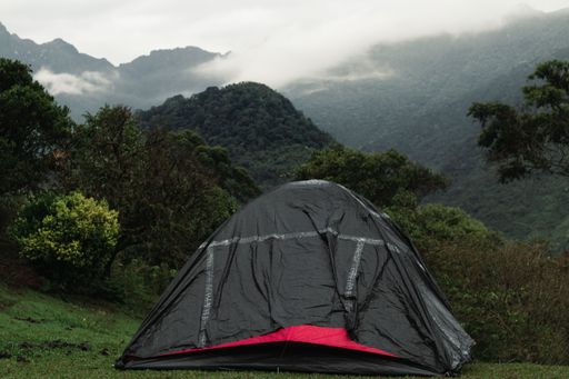 A camping tent against the mountains in Farallones de Cali, Colombia