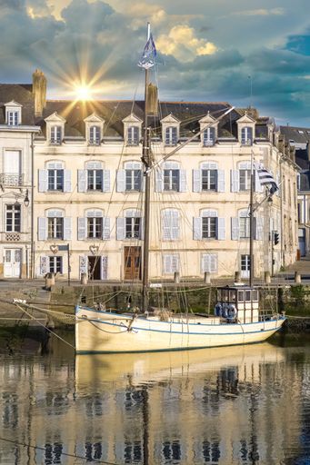 Vannes, medieval city in Brittany, boats in the harbor, with typical houses