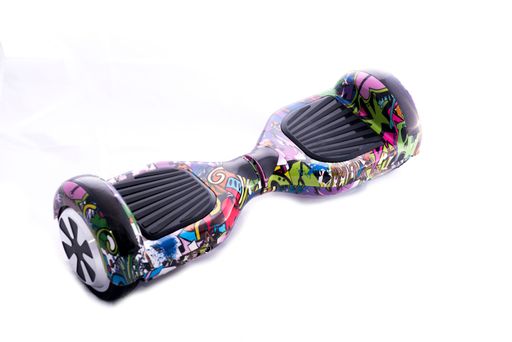 A closeup of a colorful hoverboard isolated on a white background