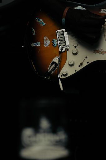 A closeup of an electric guitar