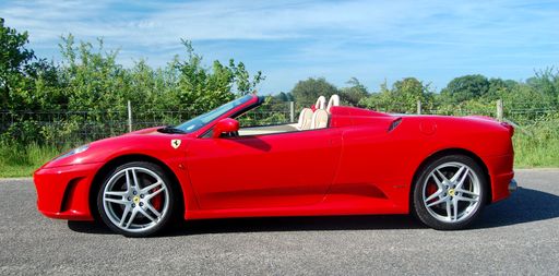 A red Ferrari F430 in the Kent countryside