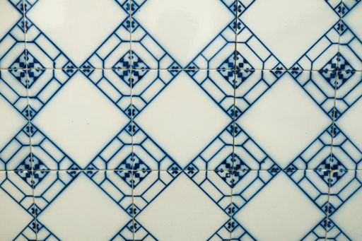The blue and white ancient mosaic on the wall in church in Portugal, Porto