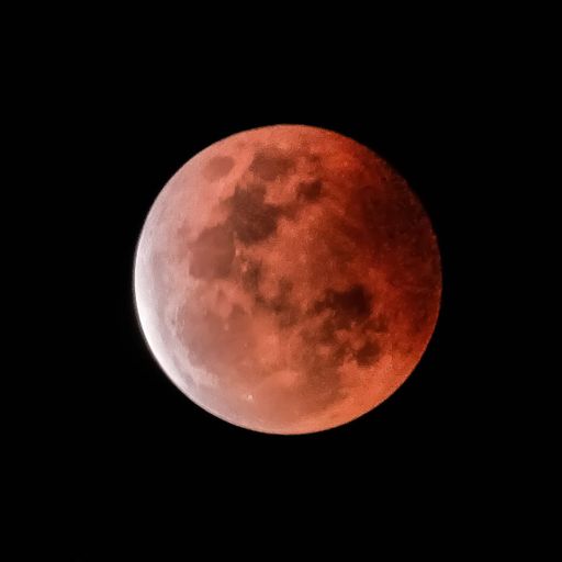 Full blood moon in the black background