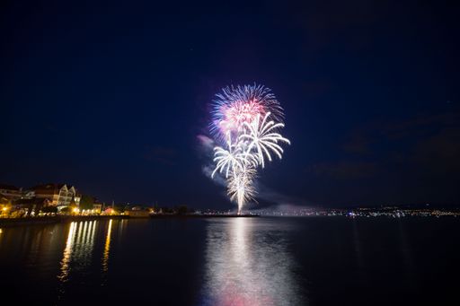 The colorful fireworks over night city and lake during the festival in Lindau