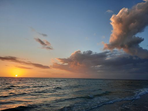 An aerial view of sea during sunset