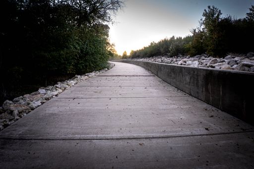 A bridge over a river surrounded by trees in Waco, Texas, United States
