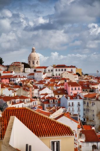 A vertical of the Lisbon cityscape on a cloudy day in Portugal