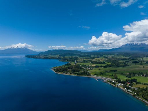 A drone shot of the Calbuco and Osorno Volcanos in Chile with Llanquihue lake on its foot