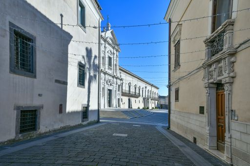 A narrow street among the old houses of Melfi, a village in the province of Potenza in Italy.