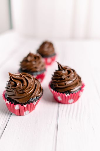 Chocolate caramel cupcake with nuts and butterscotch syrup