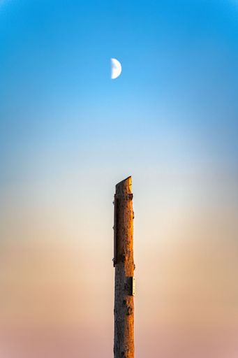A vertical shot of lighthouse St. Peter Ording with beautiful sunset sky in background