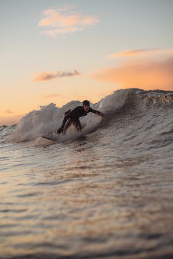 The young male swimming in the sea at Domburg, the Netherlands