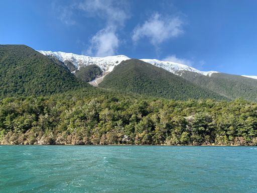 A view of the lake and snowy mountains in New Zealand