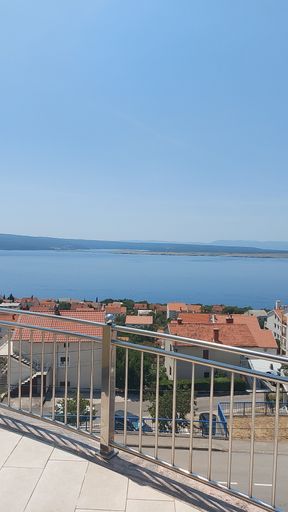 An image of sea from the balcony under the blue sky in Croatia.