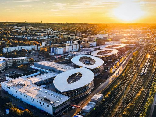 An aerial shot of the white buildings of Wolfsburg during scenic sunset, Germany