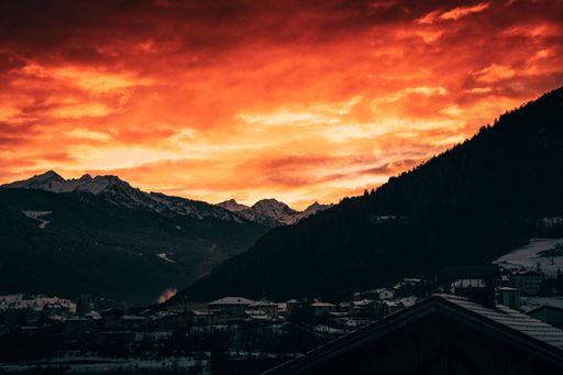 A stunning view of the majestic Alps in Trentino Alto Adige at sunset, offering a breathtaking landscape