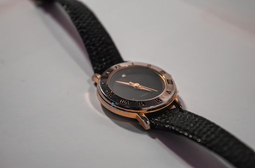 A closeup shot of a black watch