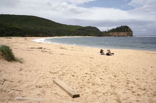 People enjoying social distance at a beach in the Bouddi National Park, NSW, Australia
