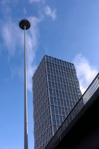 A modern office building standing tall at Bundeskanzlerplatz in Bonn, Germany
