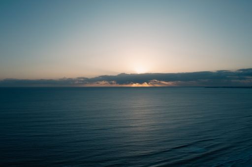 An aerial shot of a tranquil clear body of water in the sea in Burleigh Heads, Queensland, Australia