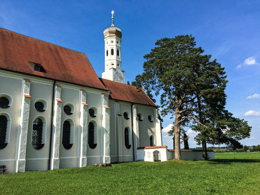 A beautiful shot of the St. Coloman church near the Neuschwanstein castle in Bavaria, Germany