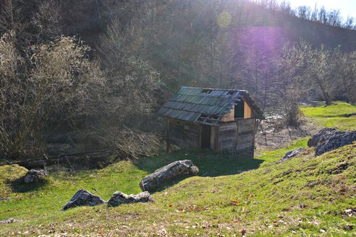 An old abandoned watermill on a sunny day