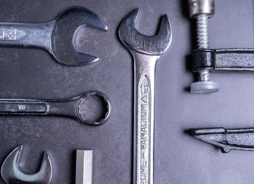 A closeup shot of working tools on gray background