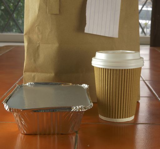 Take out food and drink on a table medium shot