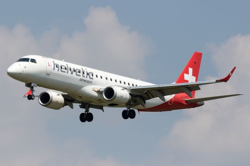 A Helvetic Airlines (Swiss Airlines) Embraer E190 flying over the Krakow Airport