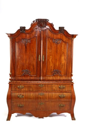 A closeup shot of a vintage chest of drawer commode isolated on white background