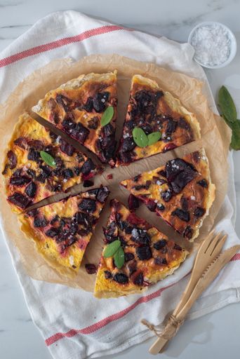 A fresh homemade tart with feta cheese and beetroot