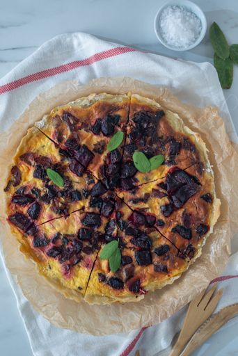 A fresh homemade tart with feta cheese and beetroot