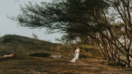 Beautiful wedding shot of a couple in the woods of Rio de Janeiro.