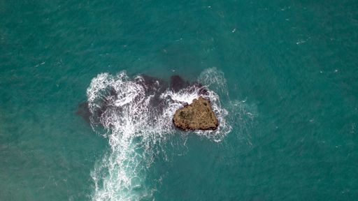 On the coast of the English Channel I discovered this stone. The waves have been beaten against the stone by the wind.