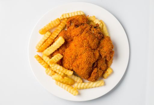 A top view of crunchy chicken and french fries